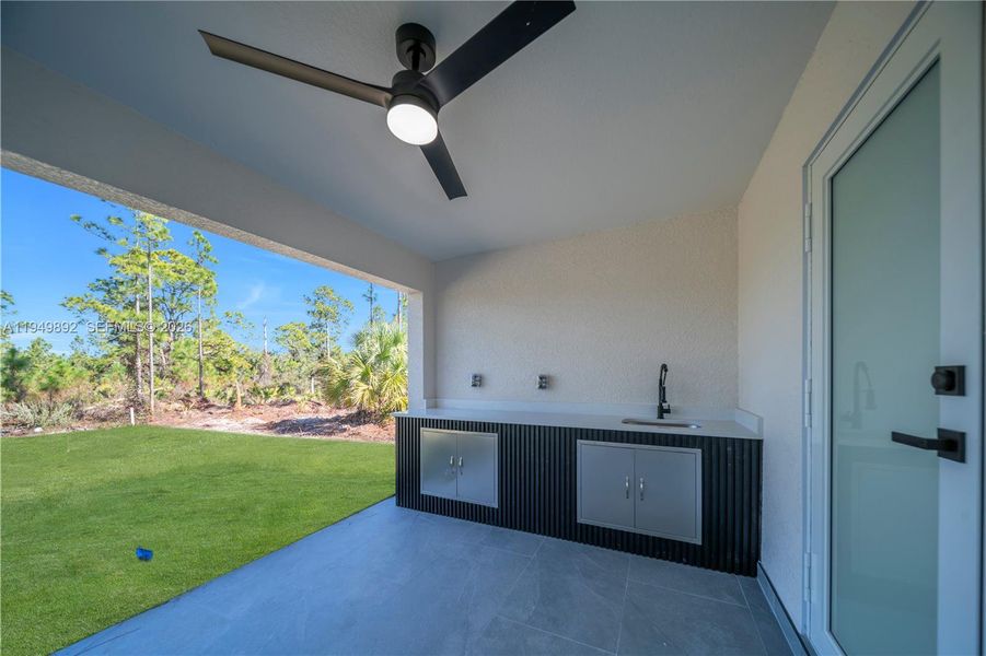 Exterior details and patio area of a home in , Lehigh Acres (Image 4).
