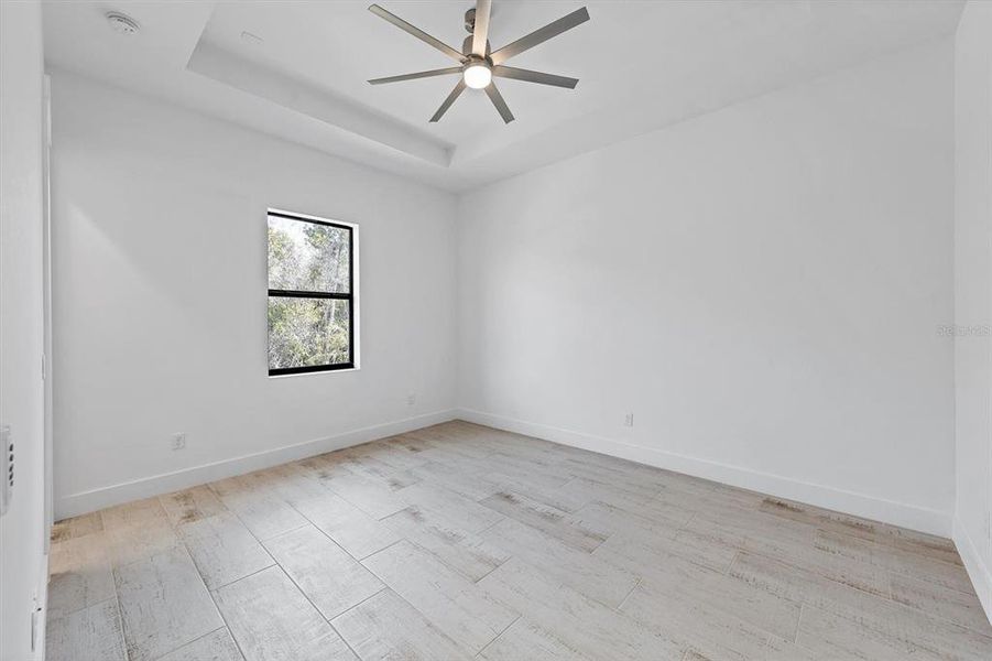 Spacious, unfurnished interior of a new home in , Port Charlotte (Image 25).