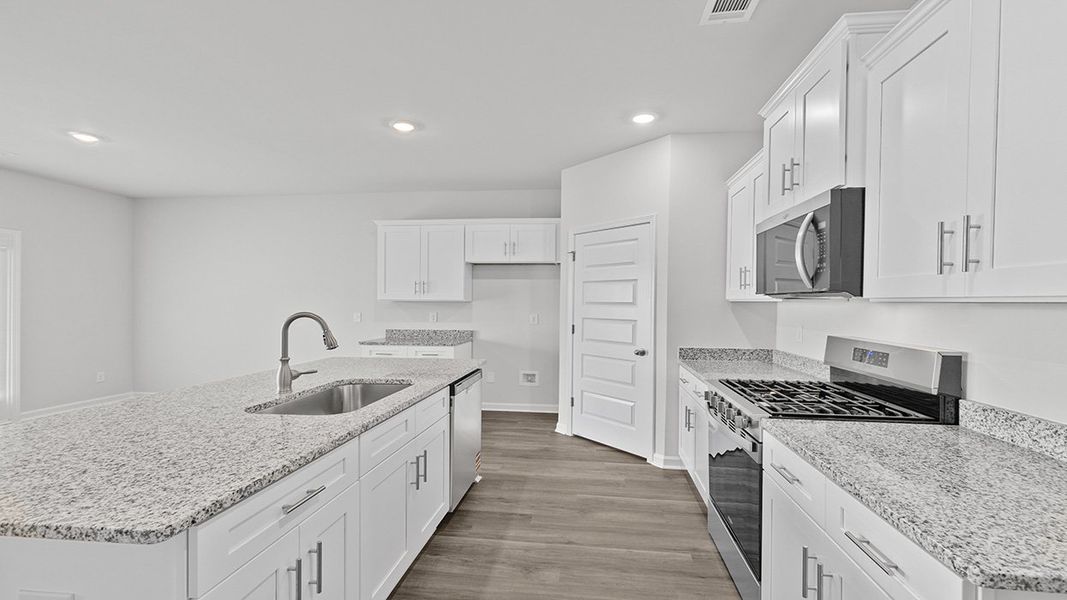 Furnished interior view inside a new home in Highland Hills, Graniteville (Image 11).