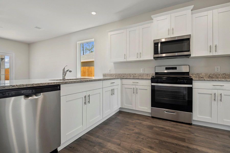 Furnished interior view inside a new home in Sweetwater Ridge, Conroe (Image 7).