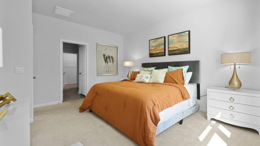Furnished interior view inside a new home in Pine Hills at Cane Bay, Summerville (Image 33).