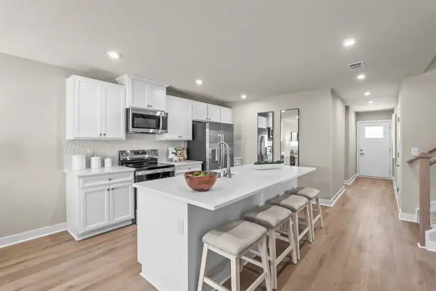 Furnished interior view inside a new home in Reidville Villas, Reidville (Image 6).