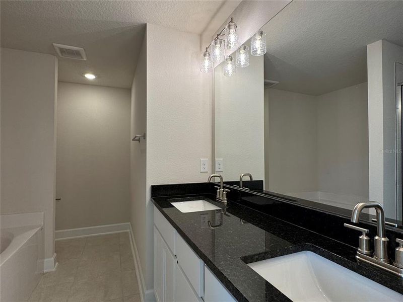 Furnished interior view inside a new home in Harmony Central, Harmony (Image 11).