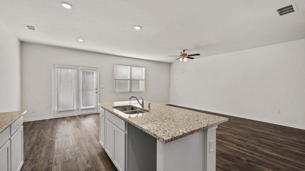 Representative furnished interior of a home built from the Salisbury by D.R. Horton in Inverness at Sugarloaf, Lawrenceville (Image 8).