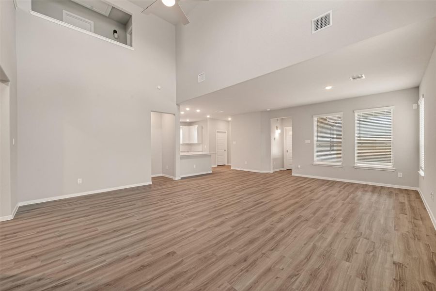 Spacious, unfurnished interior of a new home in Sunterra, Katy (Image 31).