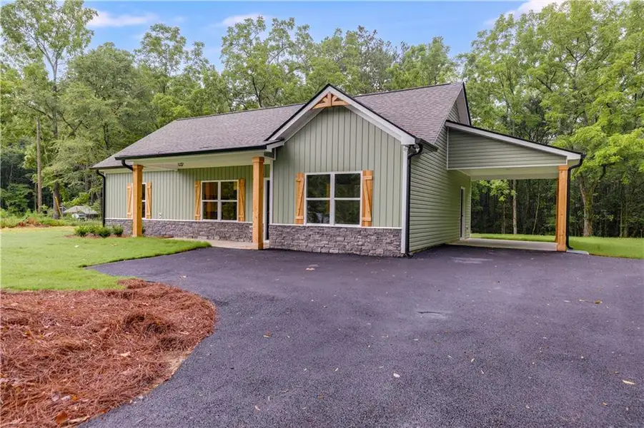 Front exterior of a new home in , Douglasville, GA, highlighting curb appeal (Image 2).
