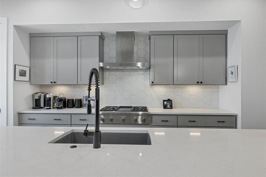 Abundant storage in the custom cabinetry keeps your kitchen organized and clutter-free, making meal prep and clean-up a breeze