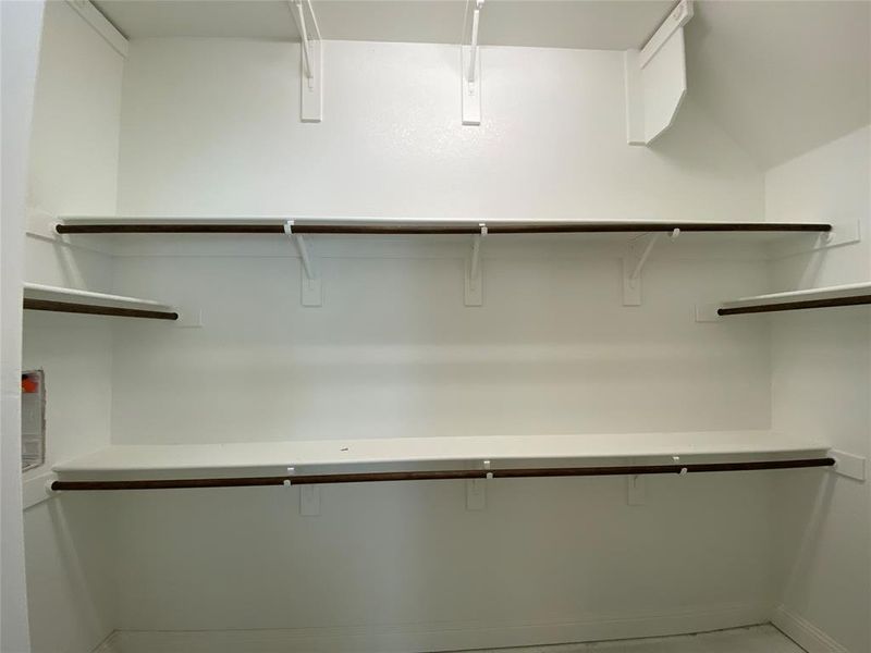 Large master closet has 3rd rail for seasonal storage Large master closet has 3rd rail for seasonal storage