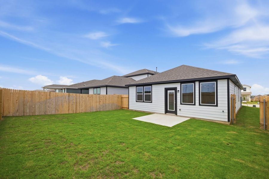 Exterior details and patio area of a home in Stallion Run, Buda (Image 4).