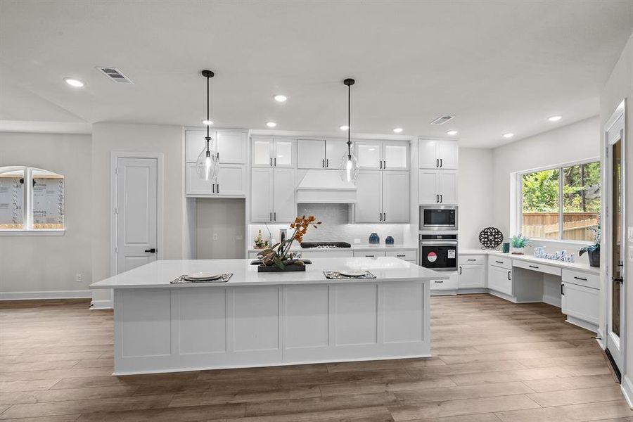 EXAMPLE PHOTO:  Beautiful Kitchen with large island/breakfast bar