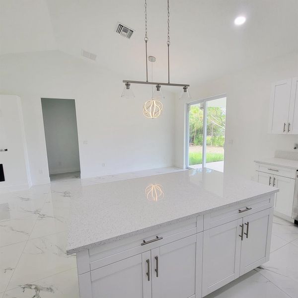 Furnished interior view inside a new home in , Okeechobee (Image 11).