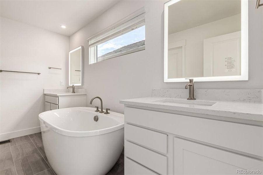 Furnished interior view inside a new home in Ascent at Inverness, Englewood (Image 4).