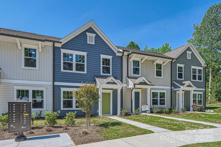 Front exterior of a new home in Dukes Ridge, Charlotte, NC, highlighting curb appeal (Image 26).