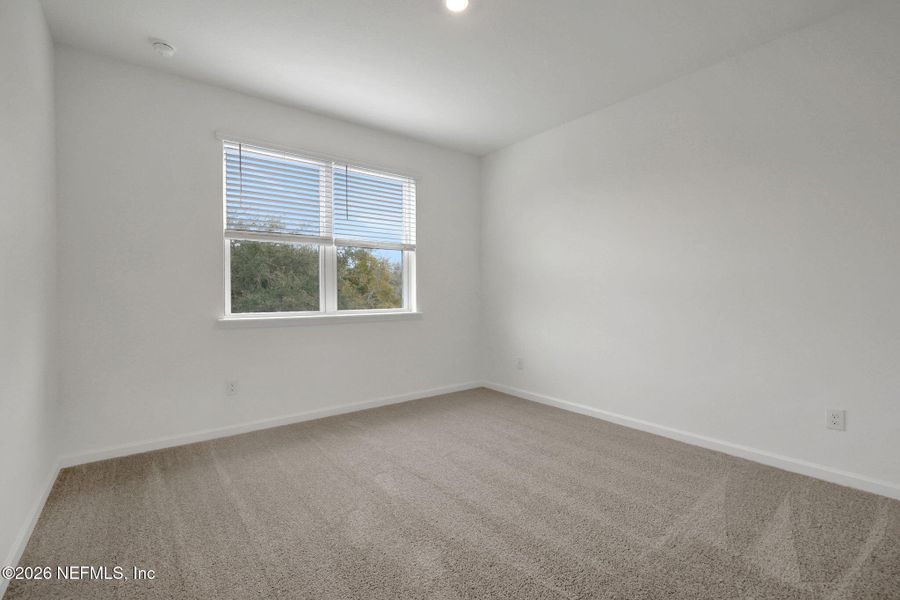 Spacious, unfurnished interior of a new home in The Hammock at Palm Harbor, Palm Coast (Image 28).