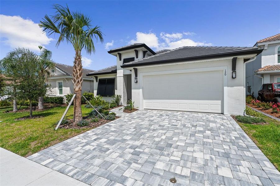 Front exterior of a new home in , Palm Coast, FL, highlighting curb appeal (Image 30).
