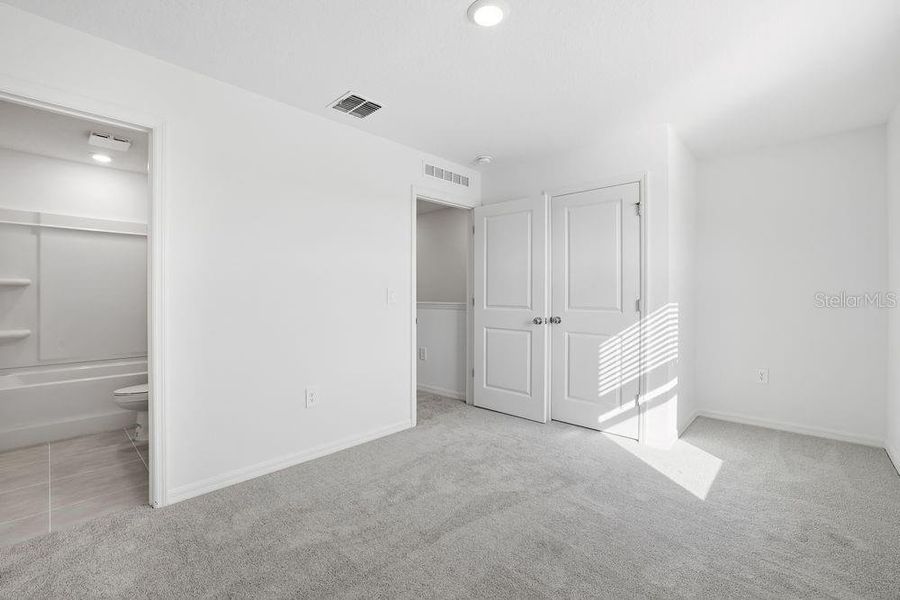 Spacious, unfurnished interior of a new home in The Towns at Firethorn, Parrish (Image 24).