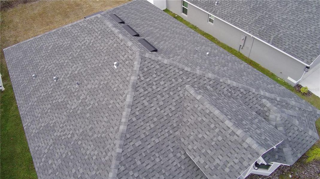 Exterior details and patio area of a home in Pine Bluff, Spring Hill (Image 27).