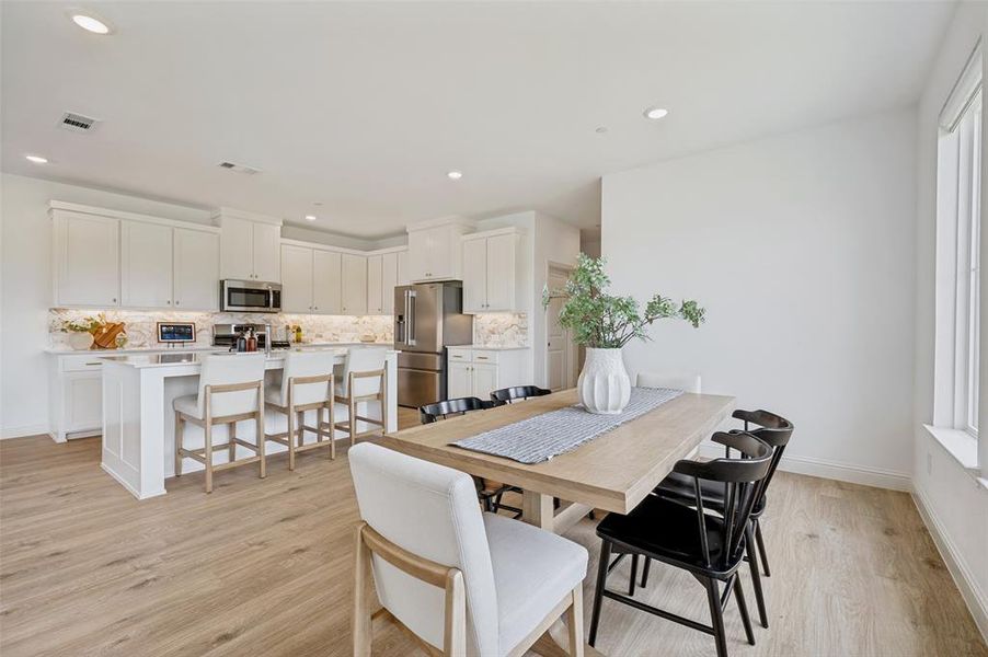Furnished interior view inside a new home in Painted Tree - Woodland District, McKinney (Image 12).