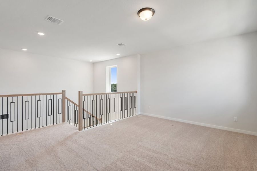 Spacious, unfurnished interior of a new home in Capitol Collection at Lariat, Liberty Hill (Image 36).