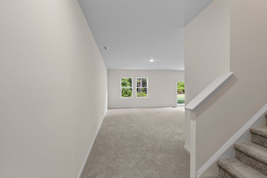 Representative unfurnished interior of a home built from the Discovery by Starlight Homes in Landings at Mount Olive, Polk City (Image 17). Representative unfurnished interior of a home built from the Discovery by Starlight Homes in Landings at Mount Olive, Polk City (Image 17).
