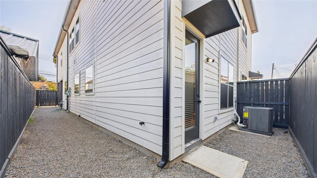 Exterior details and patio area of a home in , Houston (Image 3). Exterior details and patio area of a home in , Houston (Image 3).