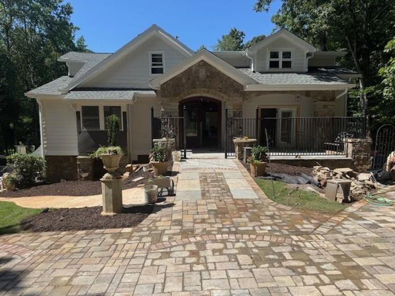 Front exterior of a new home in , Marietta, GA, highlighting curb appeal (Image 1).