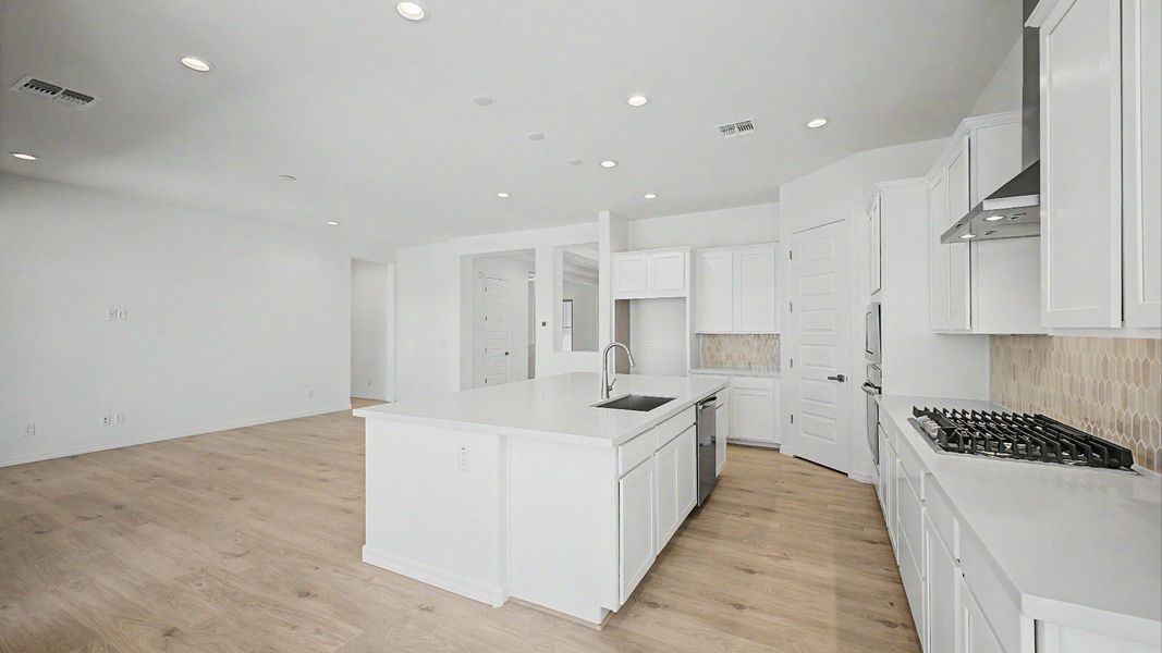 Furnished interior view inside a new home in Windrose, Waddell (Image 4).