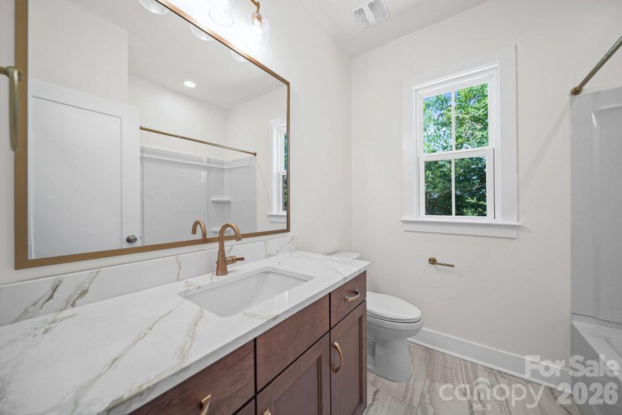 Furnished interior view inside a new home in , Monroe (Image 9).