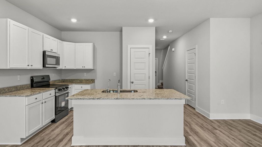 Furnished interior view inside a new home in Chateau Nemours, Port Saint Joe (Image 10).