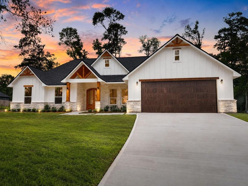 Front exterior of a new home in , Coldspring, TX, highlighting curb appeal (Image 2). Front exterior of a new home in , Coldspring, TX, highlighting curb appeal (Image 2).