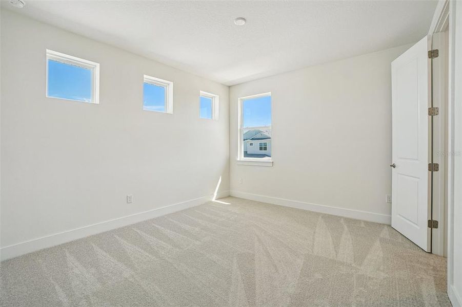 Spacious, unfurnished interior of a new home in Lagoon Residences at Epperson, Wesley Chapel (Image 43).