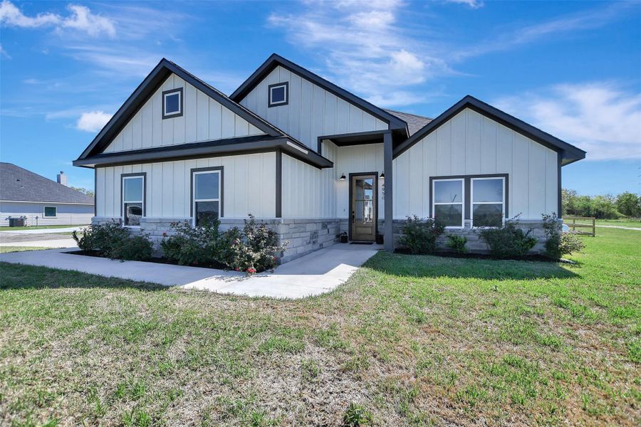 Front exterior of a new home in , Iola, TX, highlighting curb appeal (Image 23).