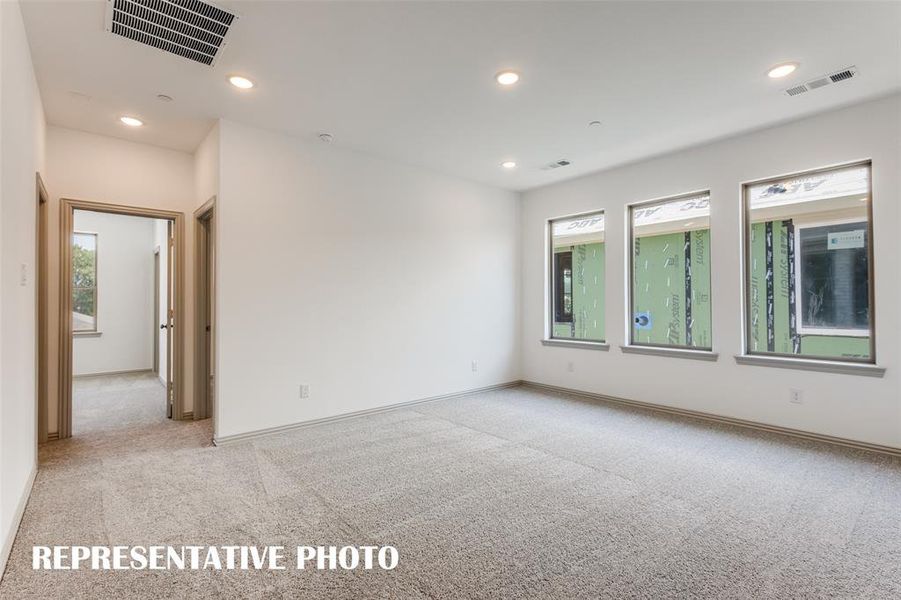 The entire family will love this light filled game room!  REPRESENTATIVE PHOTO.