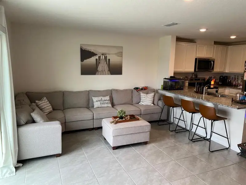 Furnished interior view inside a new home in , Harmony (Image 3).