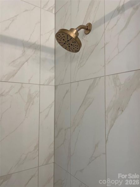 Primary Bathroom - Tile to Ceiling + Gold Plumbing Primary Bathroom - Tile to Ceiling + Gold Plumbing