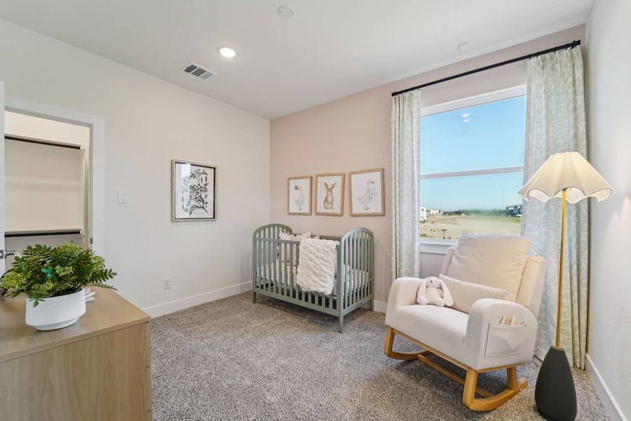 Furnished interior view inside a new home in Bridgeland, Cypress (Image 23).