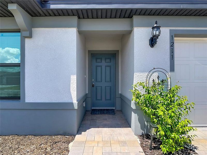 Exterior details and patio area of a home in Caloosa Cove, Labelle (Image 33).