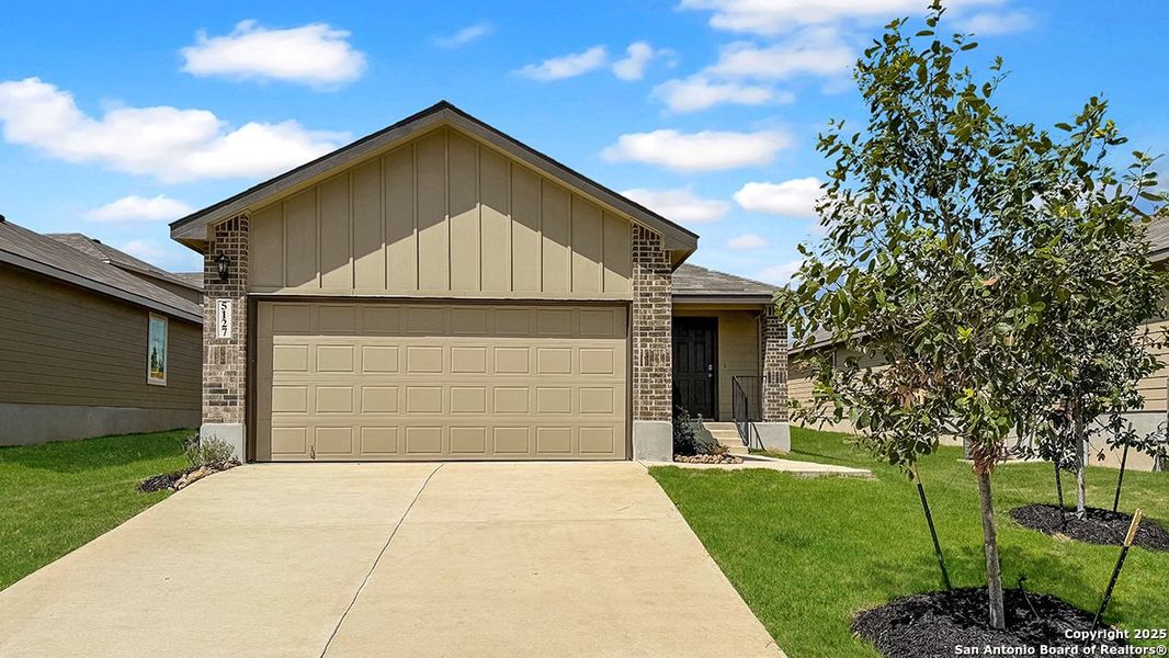 Front exterior of a new home in Langdon, San Antonio, TX, highlighting curb appeal (Image 25). Front exterior of a new home in Langdon, San Antonio, TX, highlighting curb appeal (Image 25).