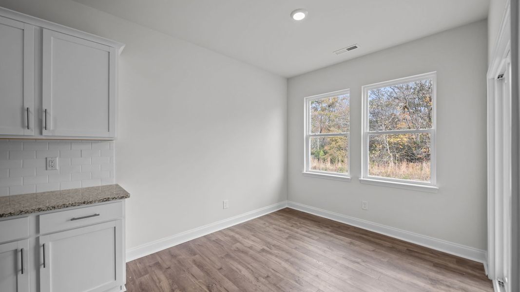 Spacious, unfurnished interior of a new home in Villa Grande, Winterville (Image 14).