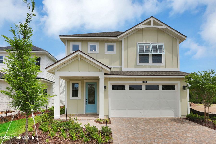 Front exterior of a new home in Seabrook Village at Seabrook, Ponte Vedra, FL, highlighting curb appeal (Image 28). Front exterior of a new home in Seabrook Village at Seabrook, Ponte Vedra, FL, highlighting curb appeal (Image 28).