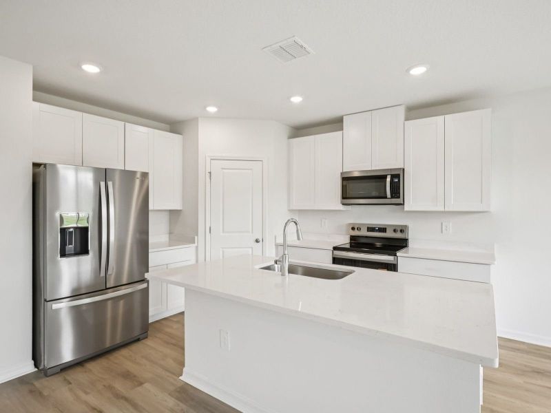 Furnished interior view inside a new home in Pine Ridge Meadows, Hudson (Image 3).