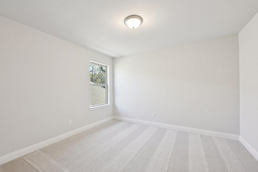 Spacious, unfurnished interior of a new home in Evergreen 40', Conroe (Image 40).