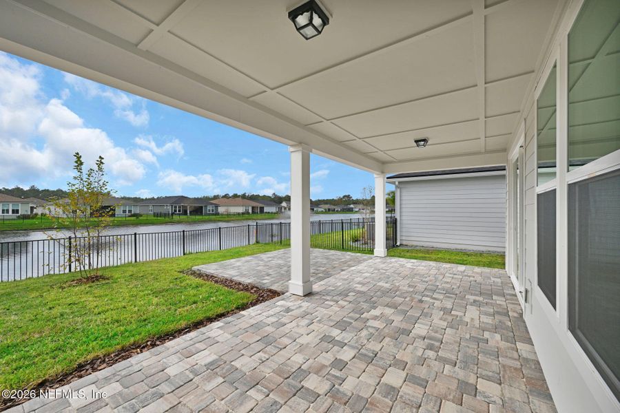 Exterior details and patio area of a home in Summer Bay at Grand Oaks, St. Augustine (Image 23).