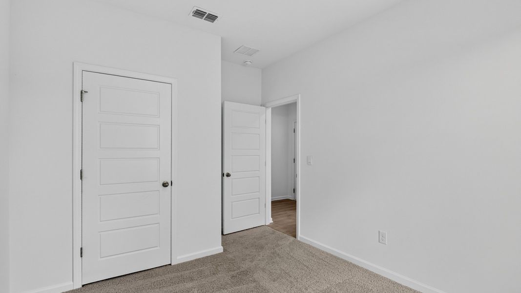 Representative unfurnished interior of a home built from the Riverside by D.R. Horton in Sawmill Branch, Palm Coast (Image 19).