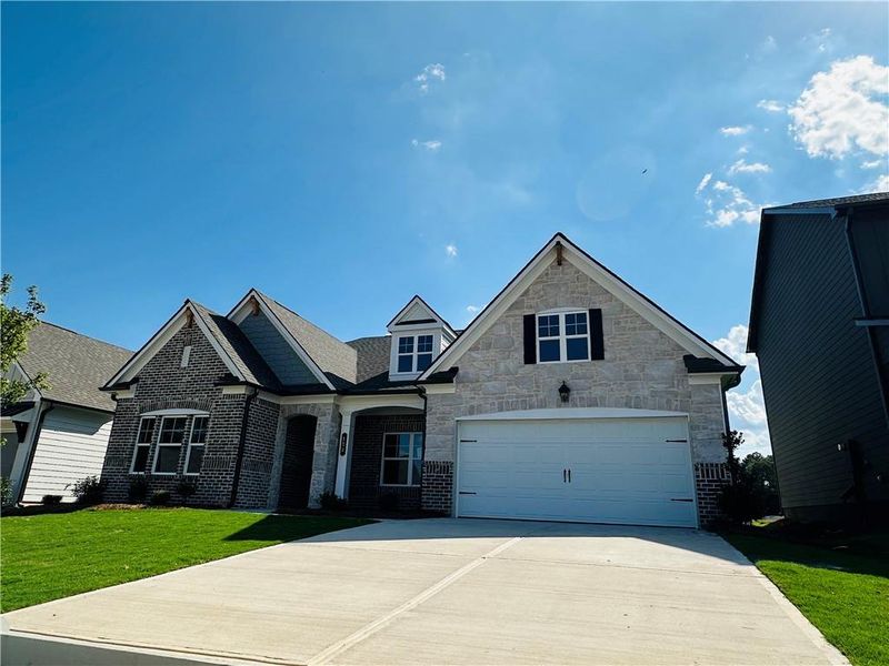 Front exterior of a new home in Summerlin, Winder, GA, highlighting curb appeal (Image 28).