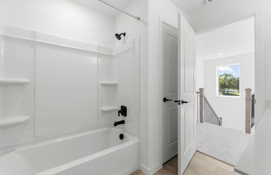 Furnished interior view inside a new home in Monarch on Main, Round Rock (Image 6).