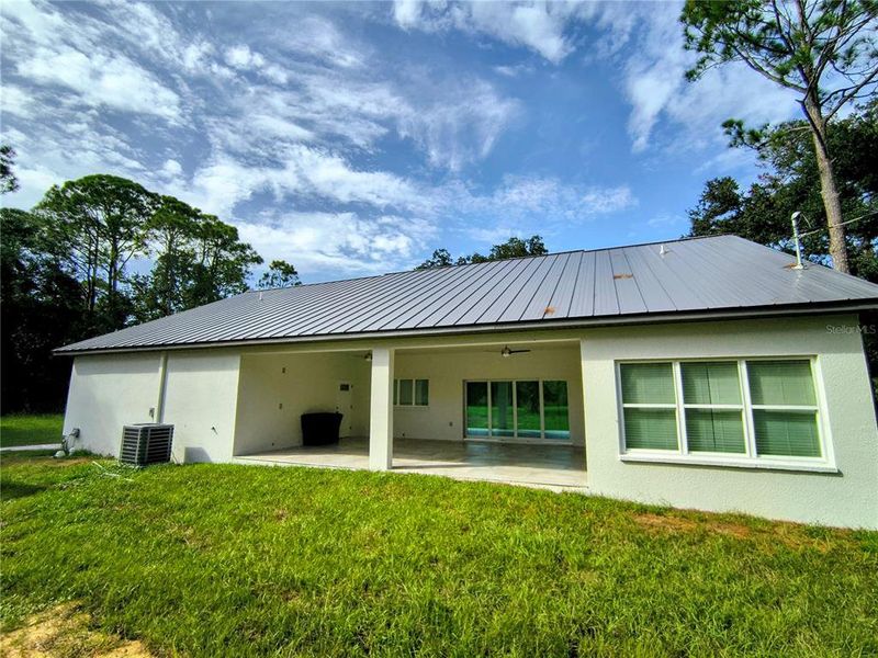 Exterior details and patio area of a home in , Davenport (Image 3).