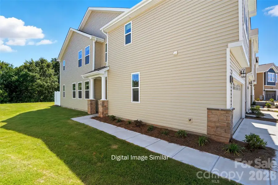 Exterior details and patio area of a home in Bailey Run, Charlotte (Image 3).