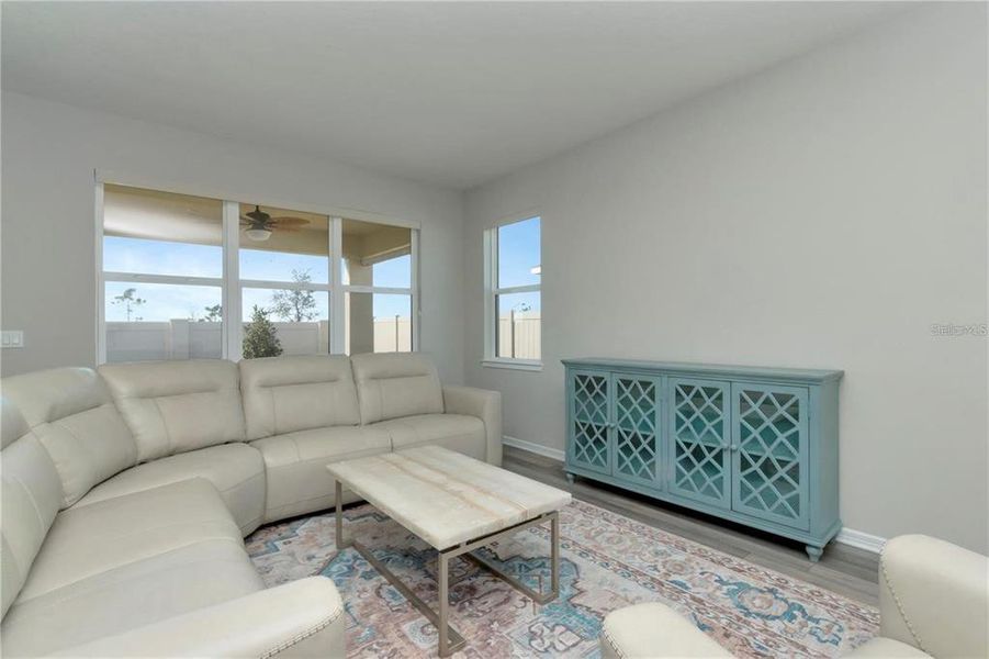 Furnished interior view inside a new home in Tohoqua Reserve, Kissimmee (Image 13).