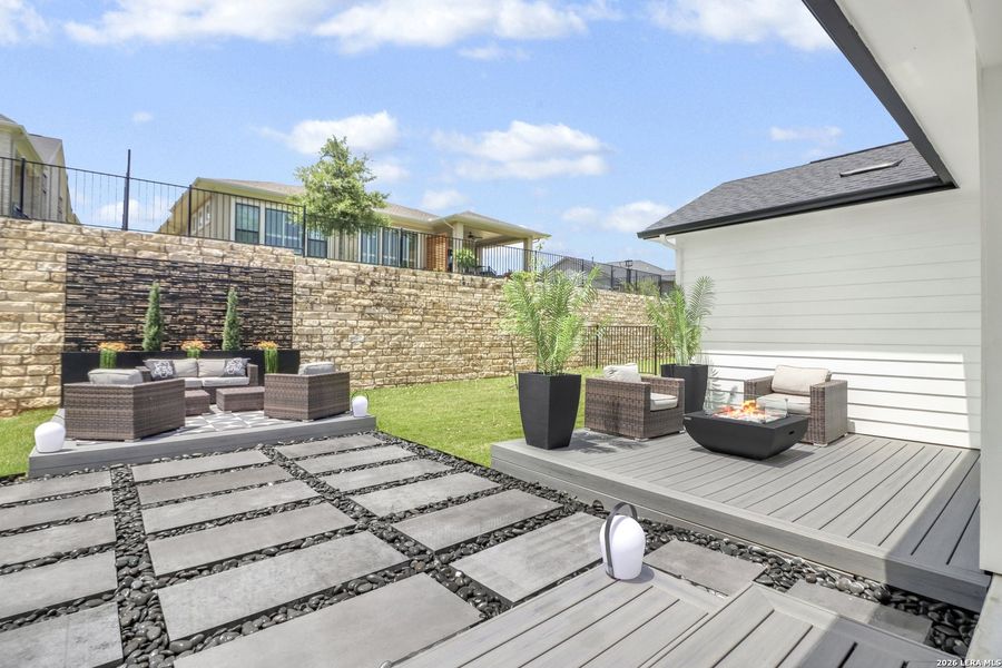 Exterior details and patio area of a home in Kissing Tree, San Marcos (Image 27).